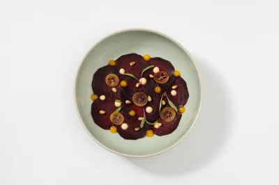 Beterraba, laranja, kumquat, pinhões e aipo